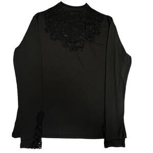 Woman’s Black Long Sleeve Top with Floral Lace Accents – Elegant & Stylish